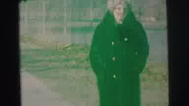 Lynbrook New York (1973): Woman In Winter Clothes Talks To The Camera And Walks