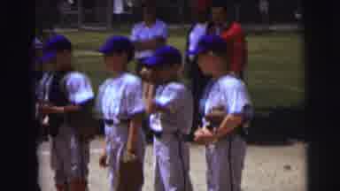 Lynbrook New York (1973): Baseball Players Wearing Blue Hats Lined Up On Playing
