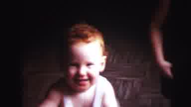 Lynbrook New York (1973): There Are Two Children One Of Whom Smiles And Sees The