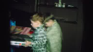 Lynbrook New York (1973): Woman Gives Young Children Toys And Watches Them Open