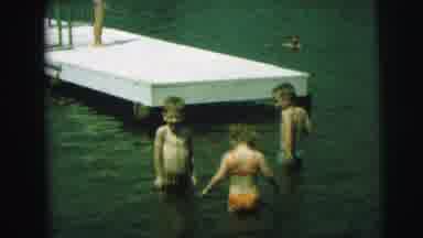 Lynbrook New York (1973): 3 Children Up To Waists In River Or Lake Water In Front