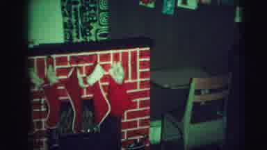 Lynbrook New York (1973): Two Kids Putting Up Stockings Around Christmas