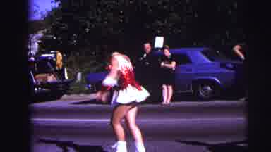 Lynbrook New York (1973): Girl Twirling Baton In Marching Band Parade