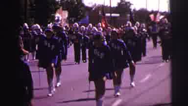 Lynbrook New York (1973): A Group Of Cheerleaders Marching In A Parade And Doing A