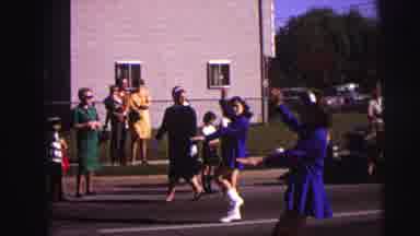 Lynbrook New York (1973): A Group Of Cheerleaders Marching In A Parade And Doing A