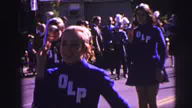 Lynbrook New York (1973): A Group Of People Performing A Parade In The City