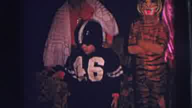 LYNBROOK NEW YORK-1973: Kids In Halloween Costumes At Family Party