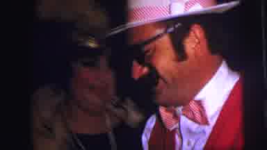 Lynbrook New York (1973): Couple Enjoys Their Time At An Event Dressed As A Can