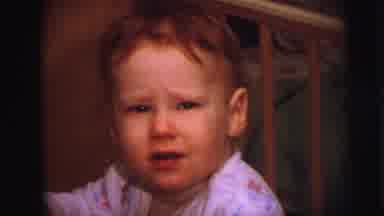 Lynbrook New York (1973): Toddler Boy Wearing Pajamas In Crib Speaking And
