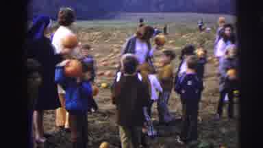 LYNBROOK NEW YORK-1973: Children Pick Pumpkins And Show Their Mothers The