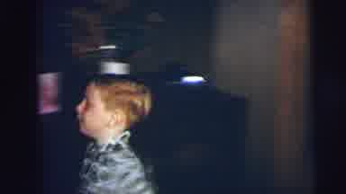 Lynbrook New York (1973): Little Boy Playing Hide And Seek By Running Into The