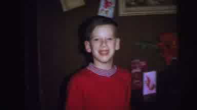 Lynbrook New York (1973): Boy In Red Shirt Walking Smiling And Waving And Girl In