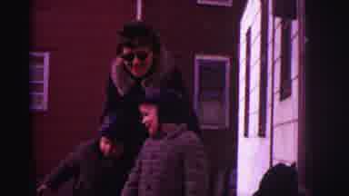 Lynbrook New York (1973): Woman And Two Kids Look At Blue And White Parade Banner