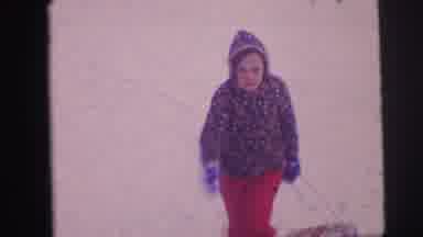 Lynbrook New York (1973): Children Climb Hill Dressed In Winter Clothes And Pull A