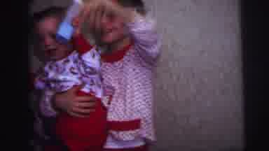 Lynbrook New York (1973): Children Wearing Red And White Pajamas Wave Goodbye As