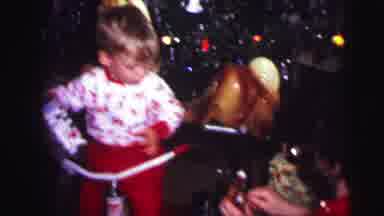 Lynbrook New York (1973): Two Boys Open Presents Under A Christmas Tree While