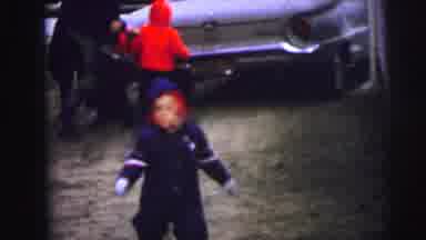 Lynbrook New York-1973: Children in Winter Clothes Play in Driveway with Classic Cars