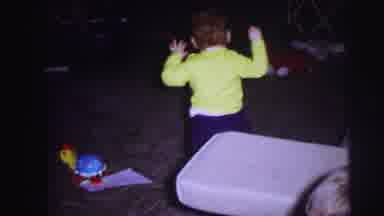 Lynbrook New York (1973): Two Young Children Play Inside The House More Precisely