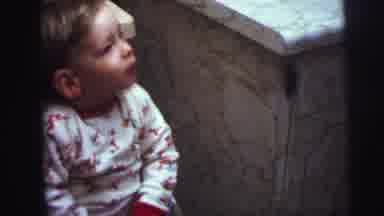 Lynbrook New York (1973): A Happy Toddler Relaxing In His Pajamas