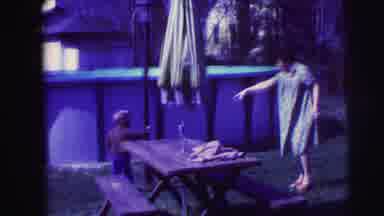 Lynbrook New York (1973): A Little Child Playing In The Garden With His Mother