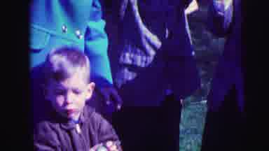 Lynbrook New York (1973): Children Dressed Up Holding Up Eggs At A Park