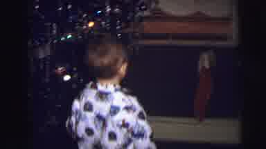Lynbrook New York (1973): A Young Boy In His Pajamas Taking His Stocking For