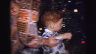 Lynbrook New York (1973): Adult Grabbing Child Beside Christmas Tree And Hanging