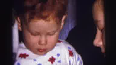 Lynbrook New York (1973): Toddler And Young Children Opening Gifts In A Room On