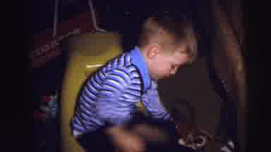 Lynbrook New York (1973): Boy Plays In The Living Room At Day Of Great Joy With