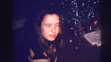 Lynbrook New York (1973): Young Mother Sits Next To Christmas Tree As Baby Lays