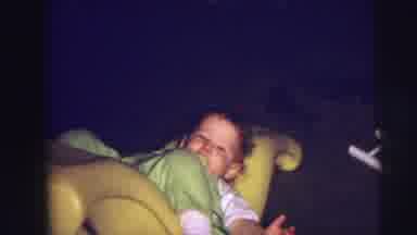 Lynbrook New York (1973): A Little Boy Swing In The Chair In His Home
