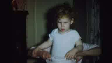 Lynbrook New York-1973: Child Standing As Caretaker Pulls Up Diaper Including
