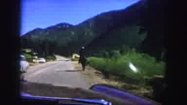 Colorado Springs USA (1958): The Car Travelling In The Road The Horse Is Running