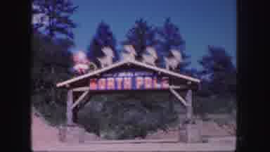 Colorado Springs USA (1958): A Sigh Near Some Trees That Says North Pole Near Some
