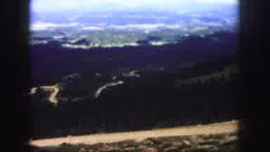 Colorado Springs USA (1958): Footage Of A Drive Through A Mountain Range Showing