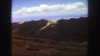 Colorado Springs USA (1958): Moving View Of A Large Mountain Across A Rocky