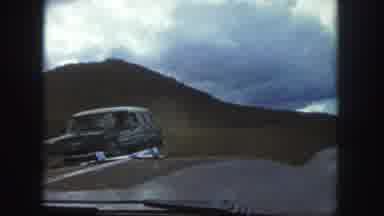 Colorado Springs USA (1958): View Through Windshield As Car Approaches A Large