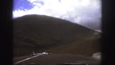 Colorado Springs USA (1958): View From Car's Hood As It Rides Down A Dirty Road