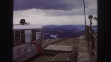 Colorado Springs USA (1958): Red And Silver Tour Train Departs On A Cloudy Day