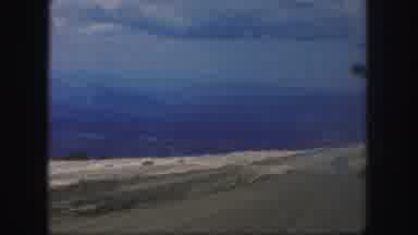 Colorado Springs USA (1958): View Of Grey Sky And Valleys Driving Along The