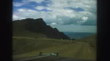 Colorado (1958): Dirt Road Leads To A Canyon With A Great View Of A River In The