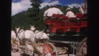 Colorado (1958): A Small Group Of People Ride A Red Carriage Being Pulled By Six