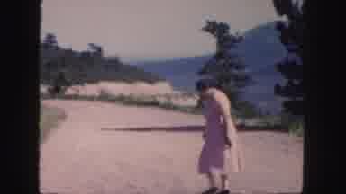 Colorado (1958): The Lady Is Walking In The Outside Of The Road