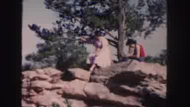 Colorado (1958): Sitting On A Rock Near The Desert Dirt Road Out West