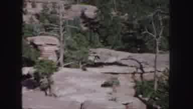 Colorado (1958): Landscape Featuring Rock Formations And Green Foliage
