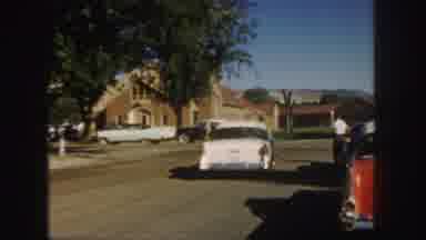 Colorado (1958): White Car On Road People Going In Church