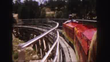 Colorado (1958): Man Traveling On A Red Mini Train On A Railway