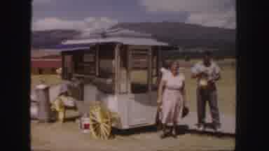 Colorado (1958): Old Woman And Man Waiting In Front Of Food Stand On Wheels As Two