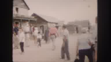 Colorado (1958): Man Wearing White Shirt Points At Man Wearing Blue Shirt
