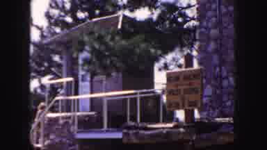 Colorado (1958): What's Looks Like A Park With A Yellow Sign With Directions On It